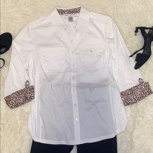 A trendy white button up